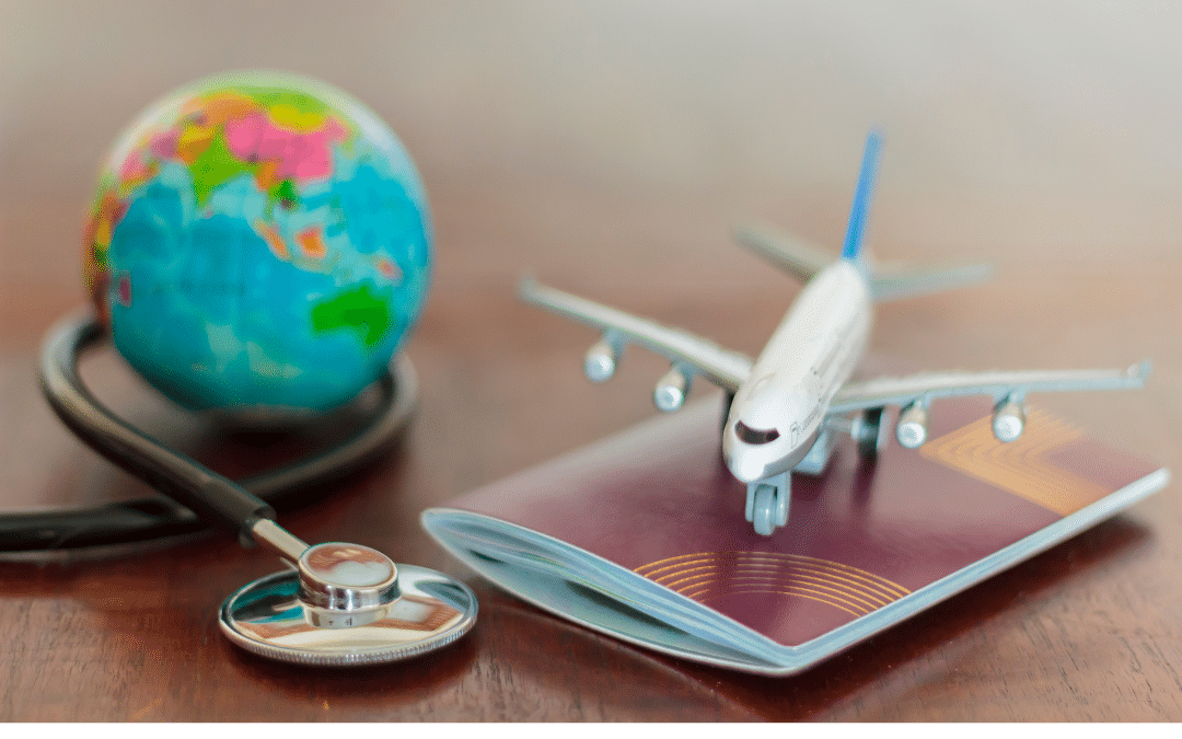 Miniature plane and globe sit near a passport and a stethoscope.