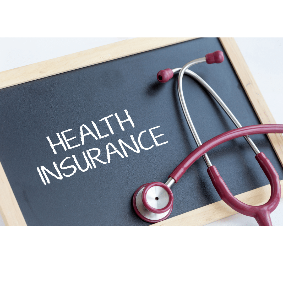 stethoscope laying on health insurance plans for expat